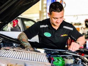 Head Technician working on a car